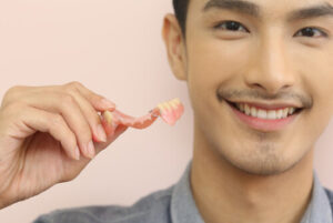can you eat with partial dentures use